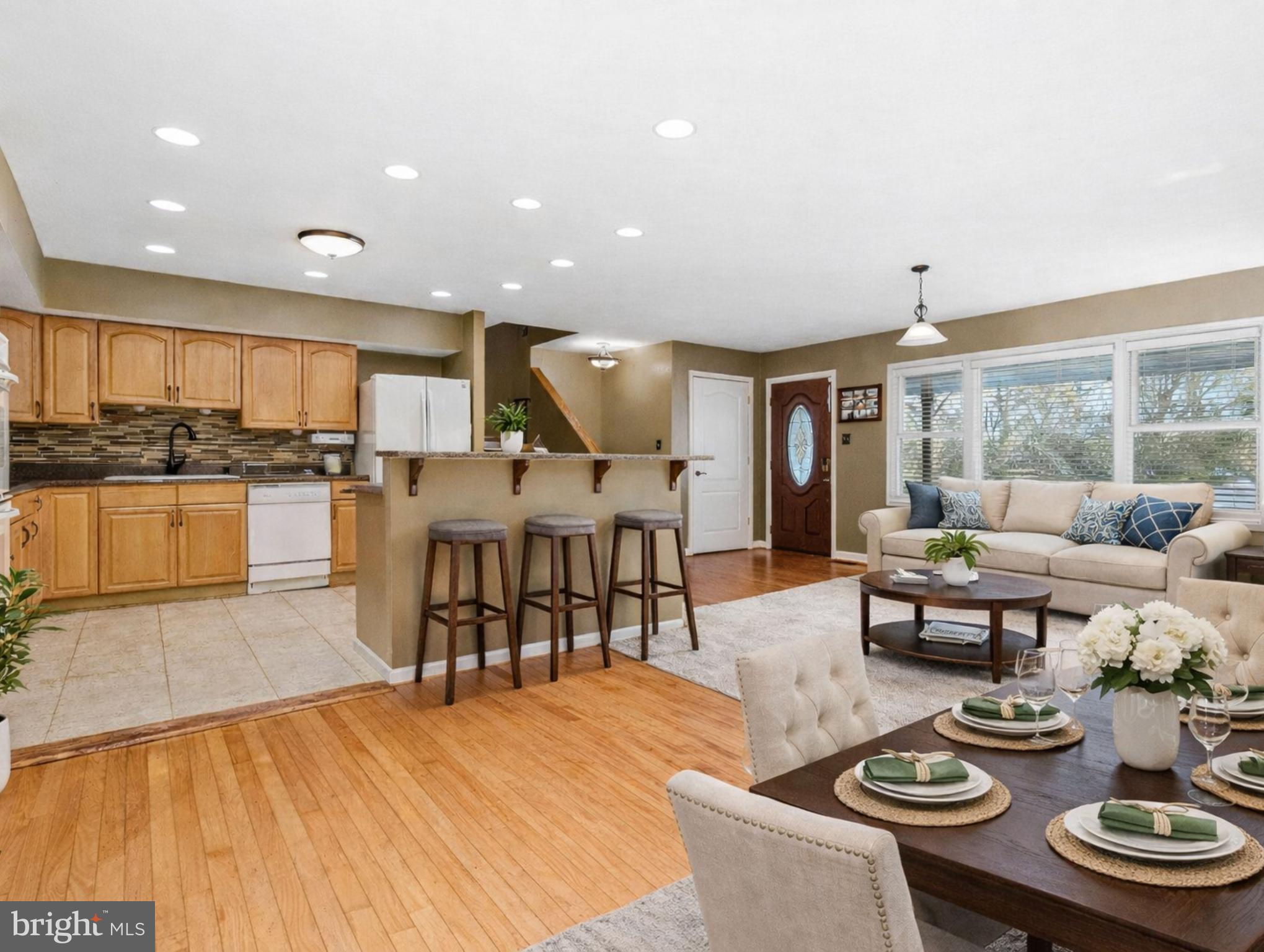 15295 Woodville Road Waldorf, MD 20601 - Photo 2 of 32 a living room with furniture and wooden floor