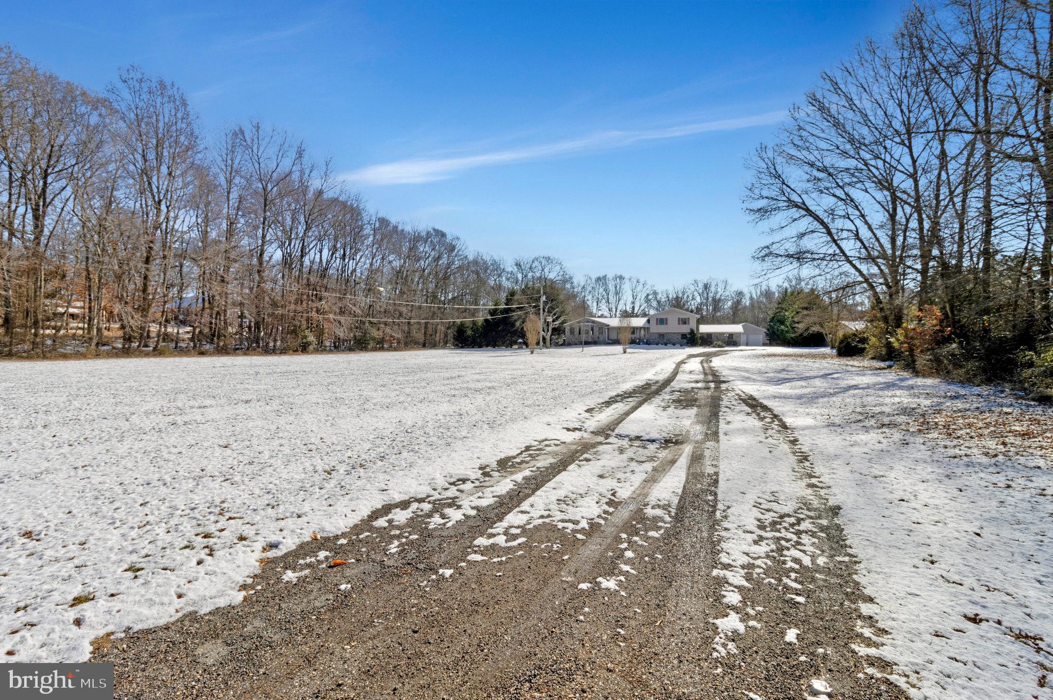 15295 Woodville Road Waldorf, MD 20601 - Photo 30 of 32 a view of a yard with trees and a pathway
