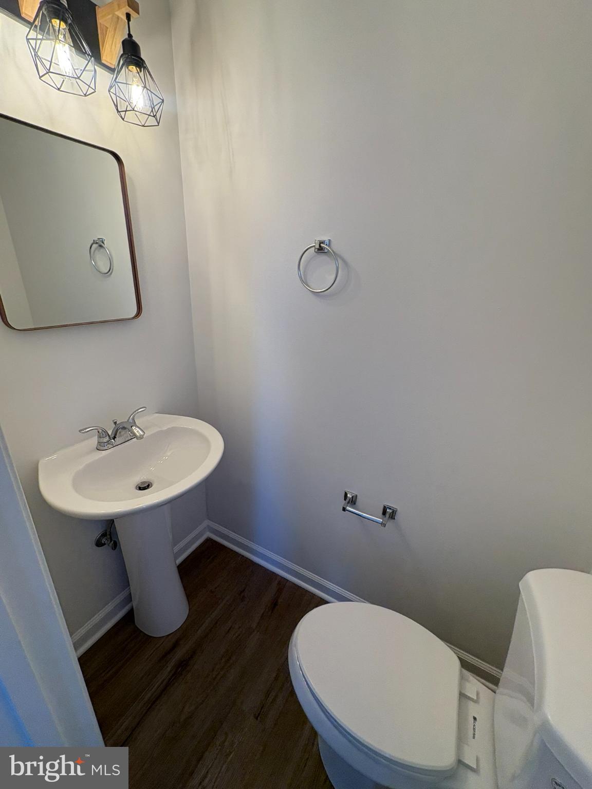 55 Fuzzy Tail Drive Ranson, WV 25438 - Photo 11 of 20 a bathroom with a sink toilet and a mirror