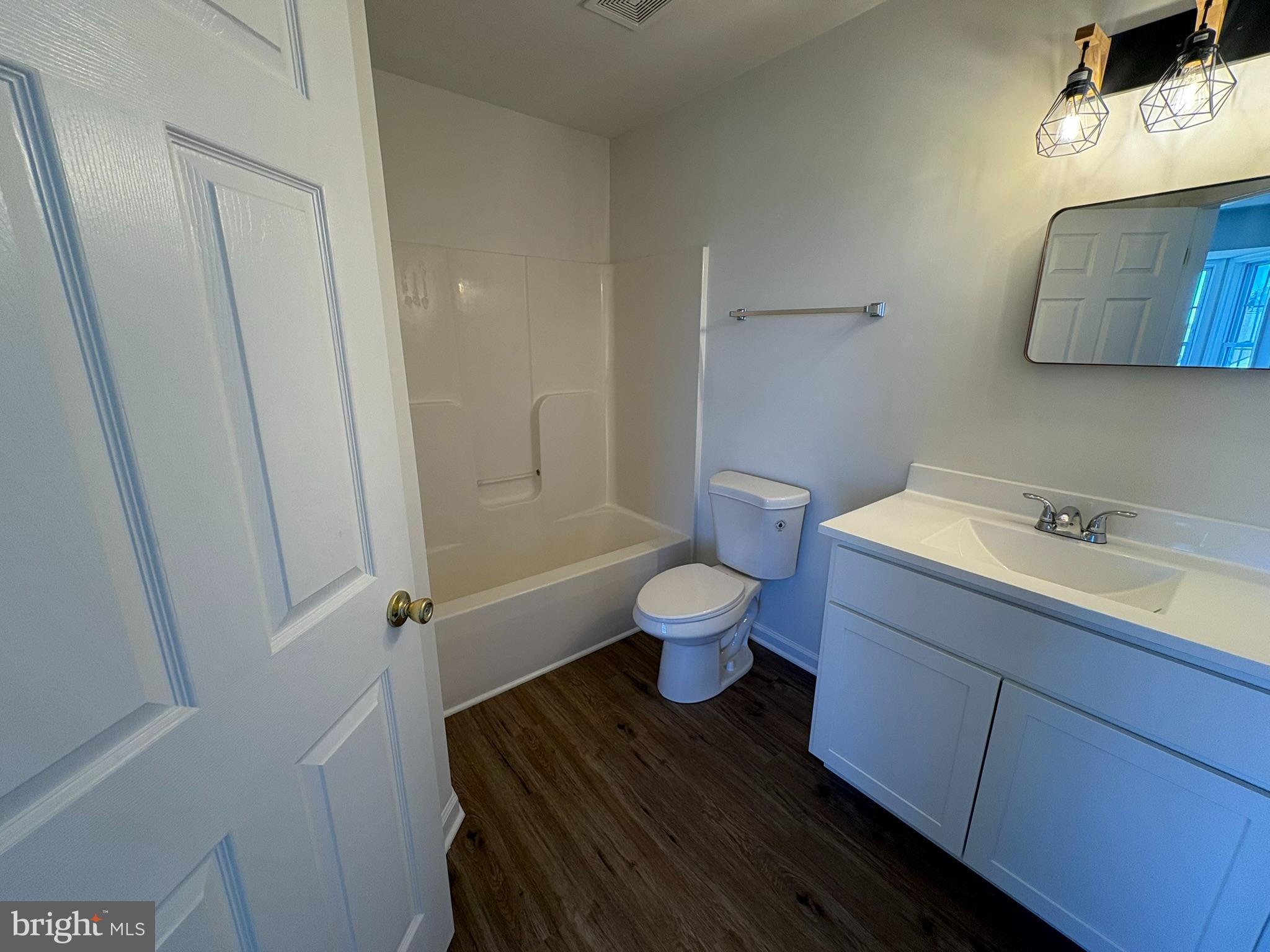 55 Fuzzy Tail Drive Ranson, WV 25438 - Photo 15 of 20 a bathroom with a sink and a mirror