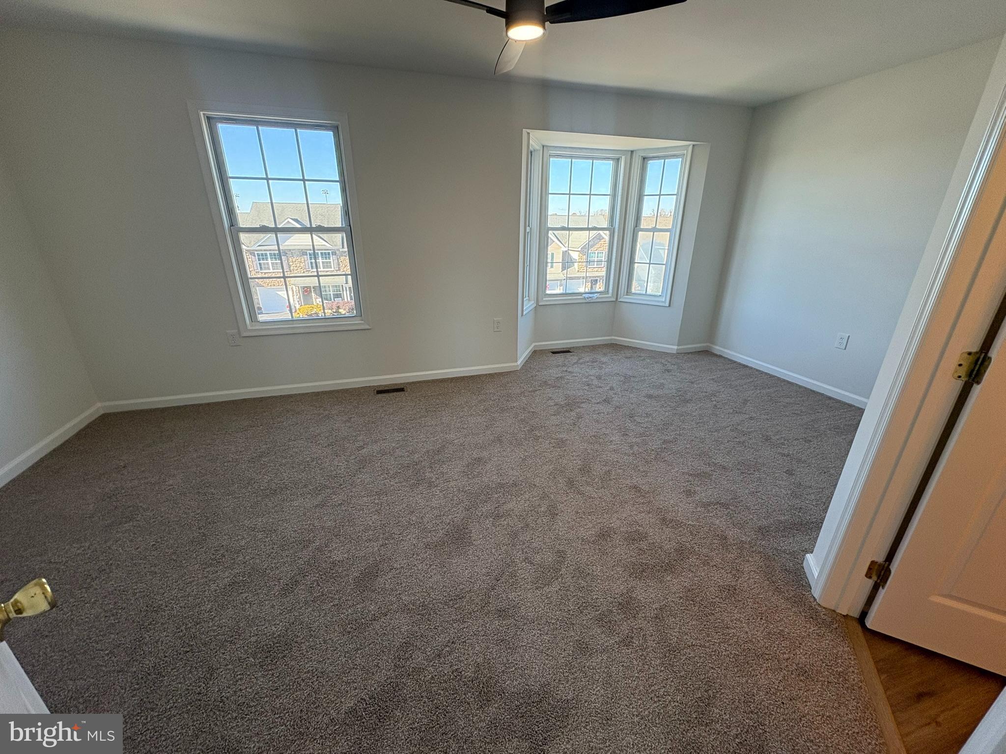 55 Fuzzy Tail Drive Ranson, WV 25438 - Photo 16 of 20 an empty room with windows