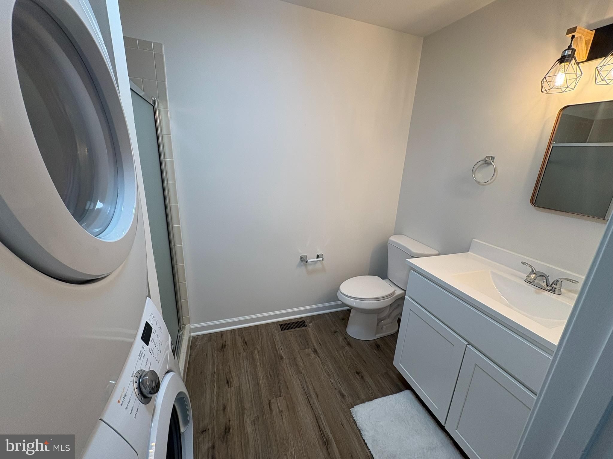 55 Fuzzy Tail Drive Ranson, WV 25438 - Photo 7 of 20 a bathroom with a toilet and a mirror