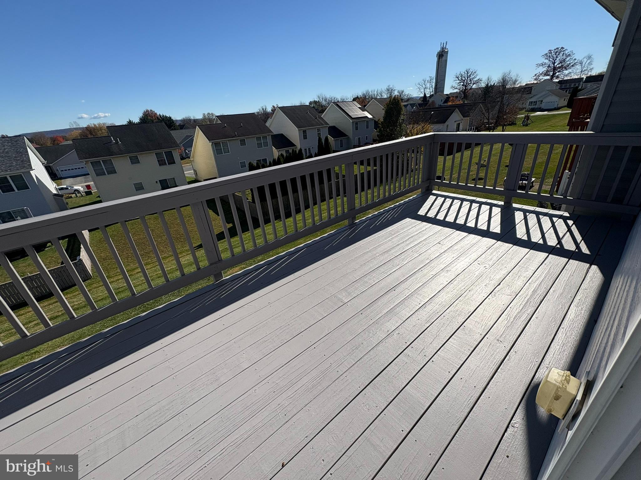 55 Fuzzy Tail Drive Ranson, WV 25438 - Photo 10 of 20 a view of balcony with wooden floor