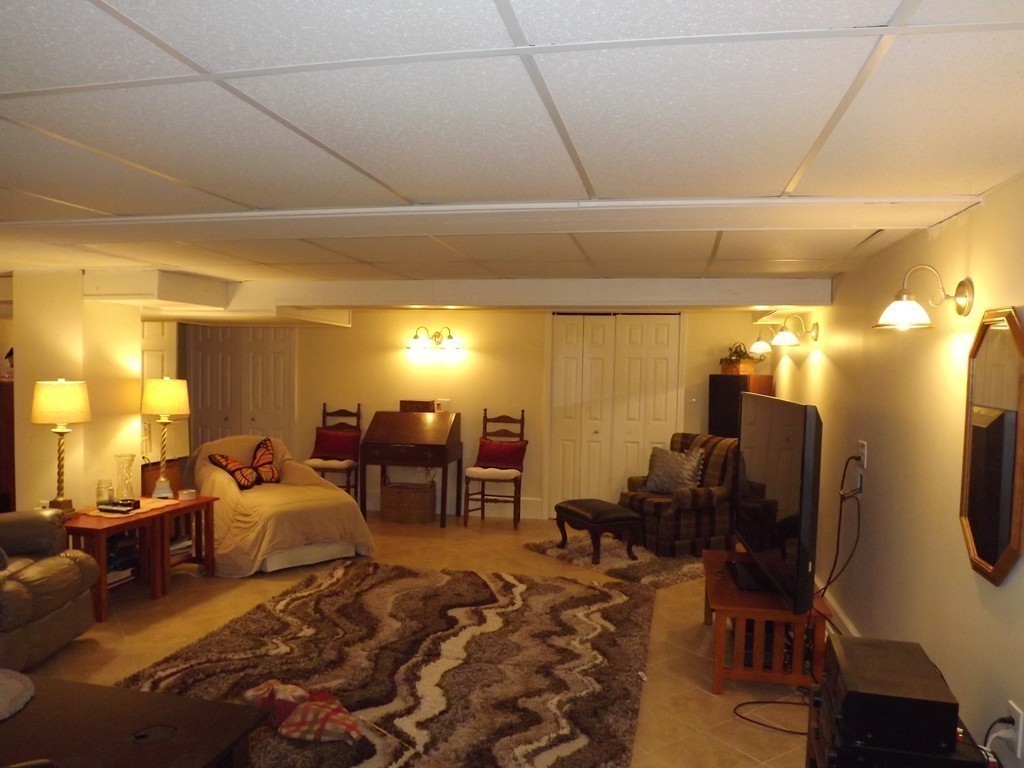 33 Fiske Hill Road Sturbridge, MA 01566 - Photo 23 of 29 a bedroom with furniture and a mirror
