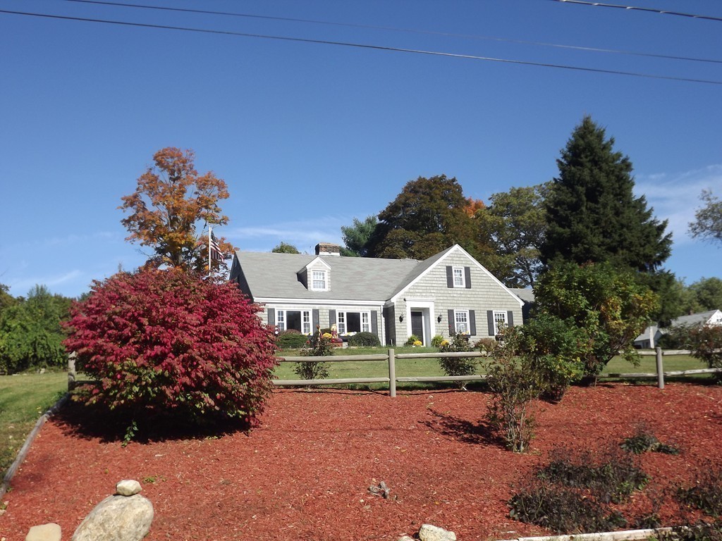 33 Fiske Hill Road Sturbridge, MA 01566 - Photo 29 of 29 a front view of a house with a yard and garage