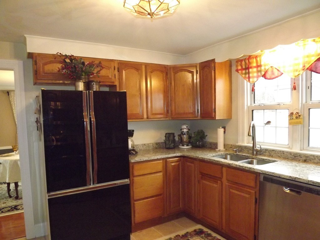 33 Fiske Hill Road Sturbridge, MA 01566 - Photo 3 of 29 a kitchen with a refrigerator and a sink