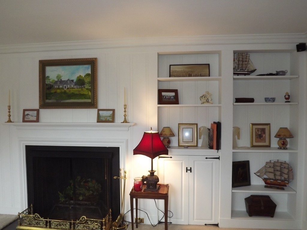 33 Fiske Hill Road Sturbridge, MA 01566 - Photo 8 of 29 a living room with furniture and a fireplace