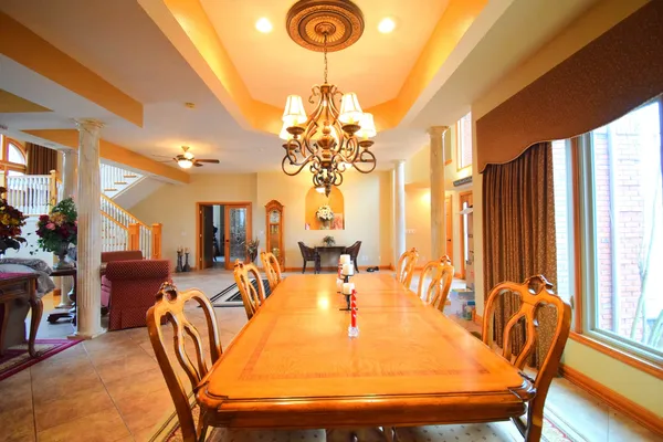 a living room with furniture fireplace and a flat screen tv