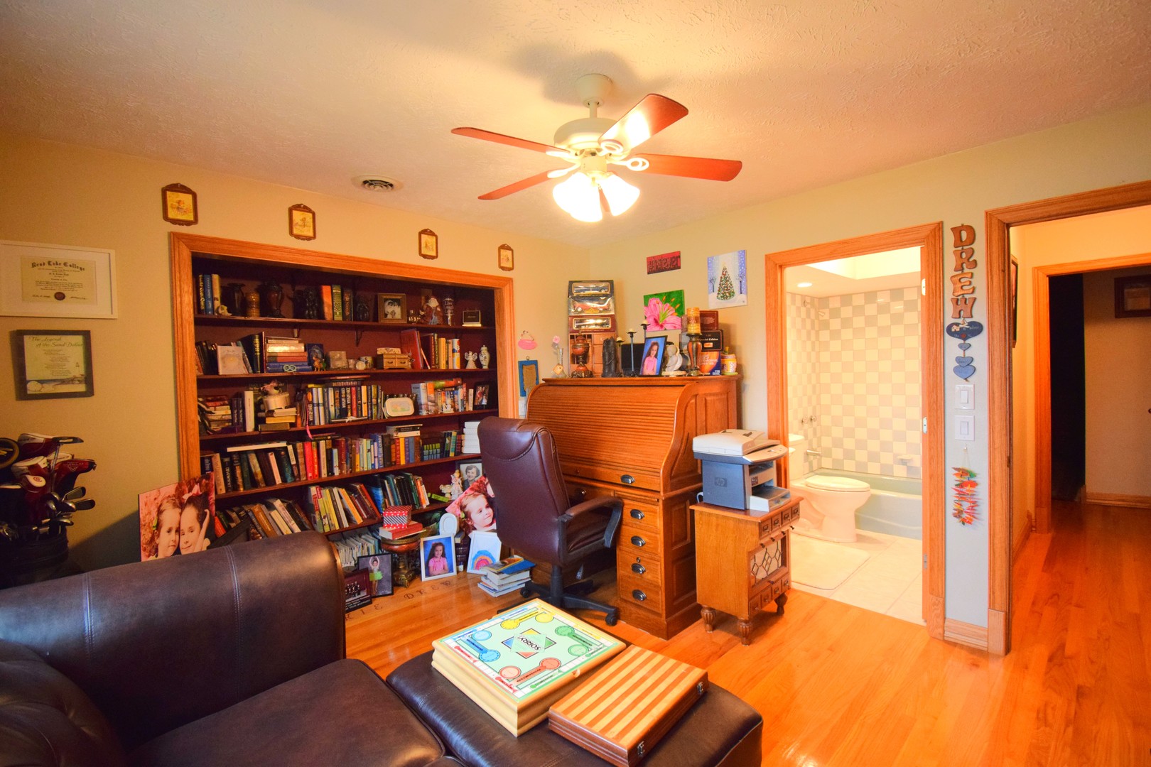 12863 Bowling Alley Road Benton, IL 62812 - Photo 39 of 50 a view of a workspace with furniture and a bookshelf