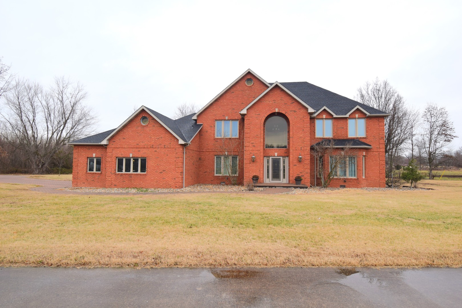 12863 Bowling Alley Road Benton, IL 62812 - Photo 9 of 50 a view of a big house with a yard and large tree