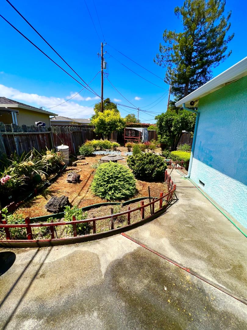 696 McCarty Avenue Mountain View, CA 94041 - Photo 26 of 31 a view of a swimming pool with a patio