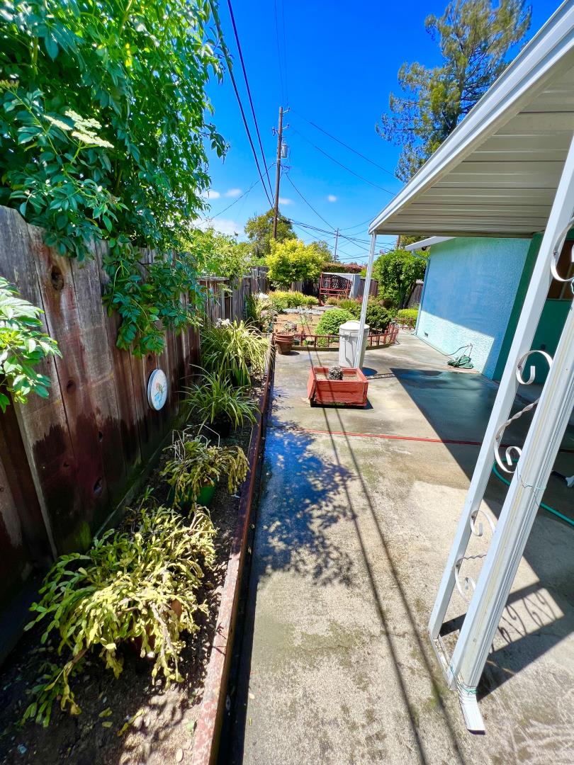 696 McCarty Avenue Mountain View, CA 94041 - Photo 27 of 31 a view of yard from deck with patio