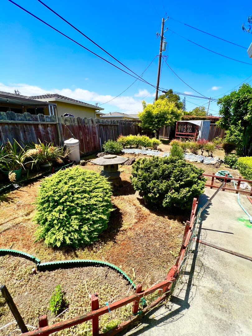 696 McCarty Avenue Mountain View, CA 94041 - Photo 29 of 31 a view of a chairs and table in a patio