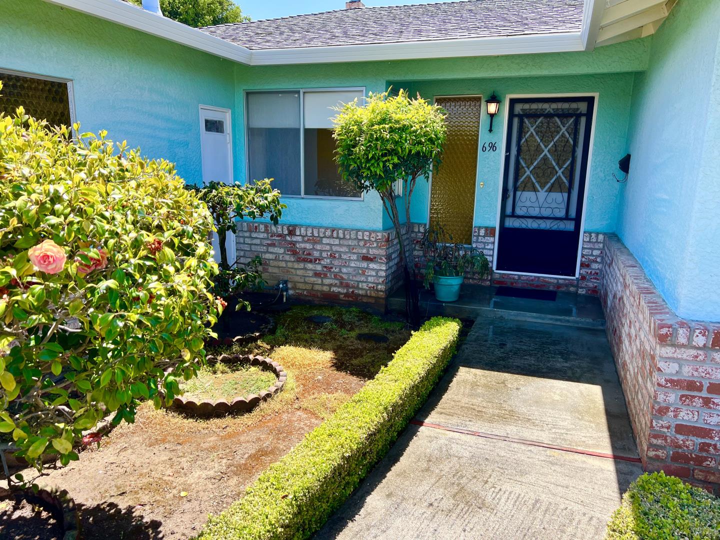 696 McCarty Avenue Mountain View, CA 94041 - Photo 3 of 31 a front view of a house