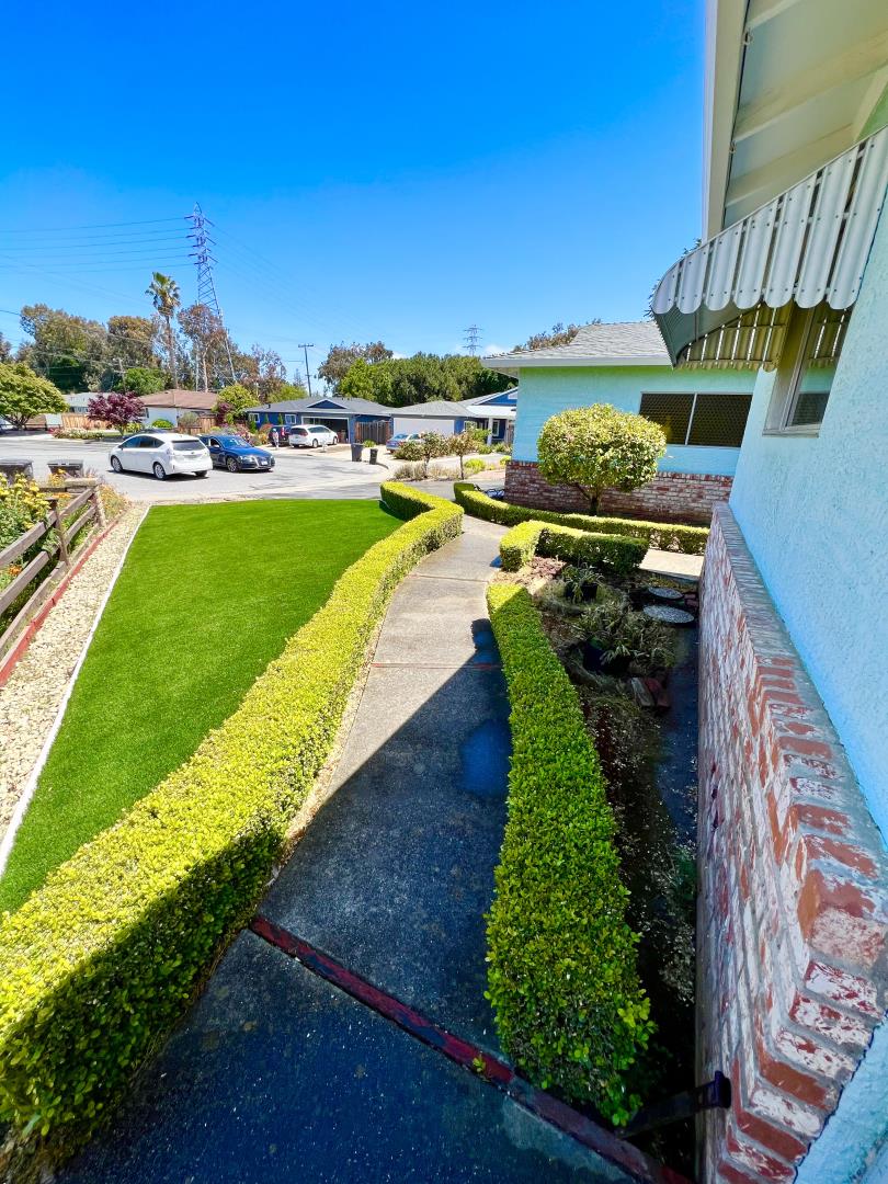 696 McCarty Avenue Mountain View, CA 94041 - Photo 4 of 31 a view of a yard with swimming pool