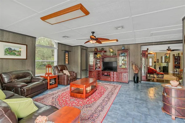 a bedroom with furniture and a couch