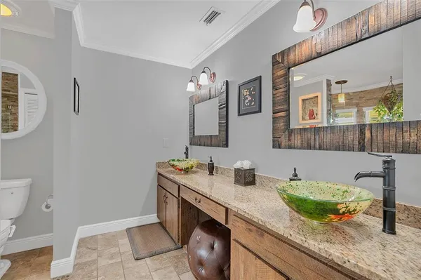 a kitchen with stainless steel appliances a counter top space appliances and cabinets