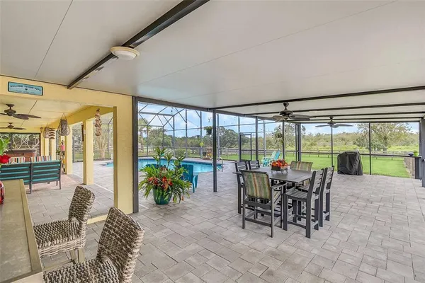 an aerial view of residential house with an outdoor space