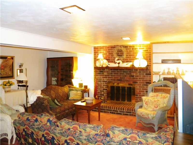 689 Schenley Road Leechburg, PA 15656 - Photo 12 of 25 Basement/Game Room. Game room with a wood burning fireplace.