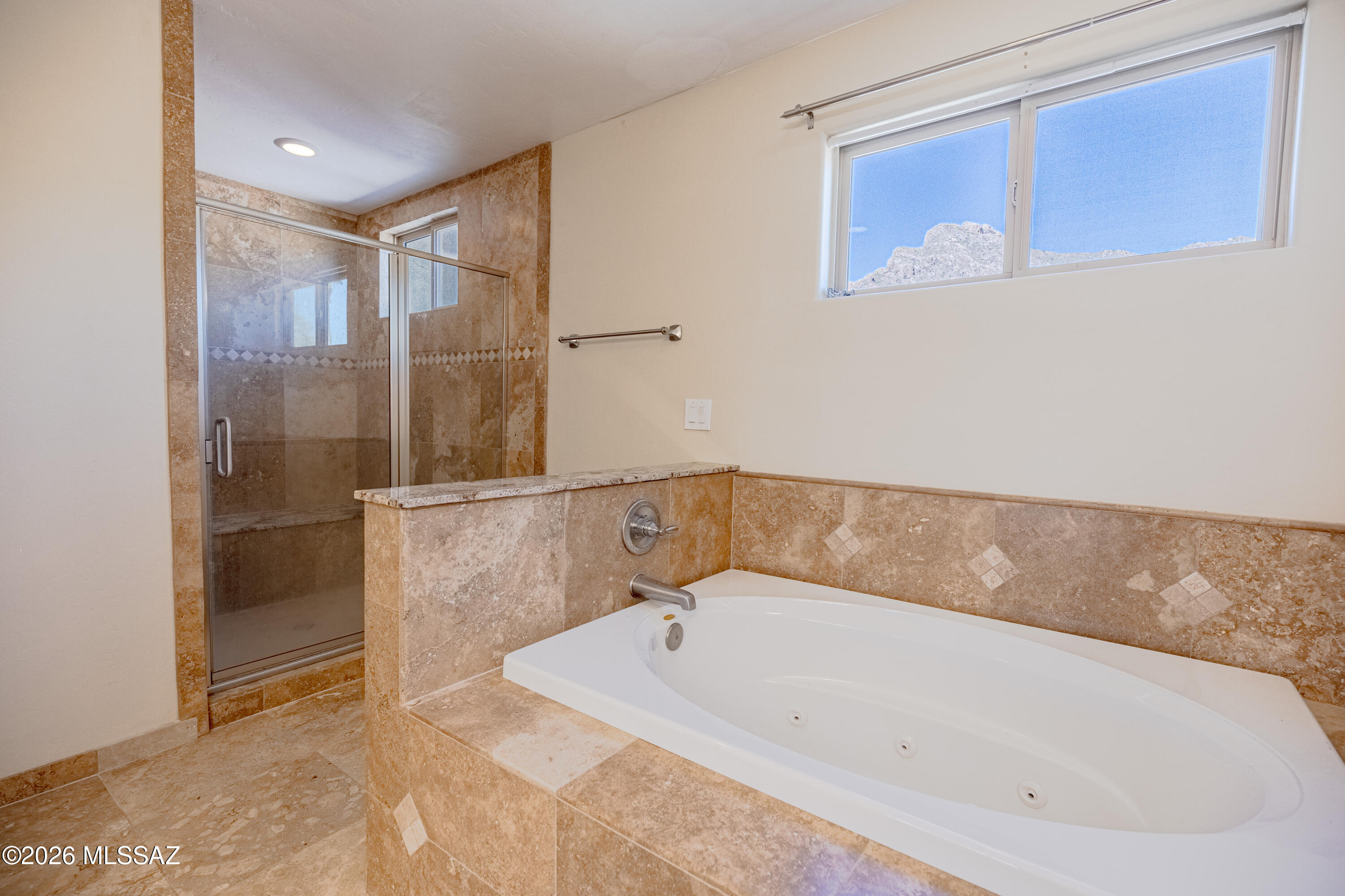 545 East Rancho Catalina Place Tucson, AZ 85704 - Photo 13 of 13 a bathroom with a bathtub and shower