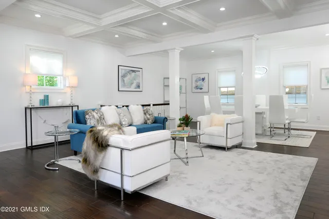 a living room with furniture and a couch