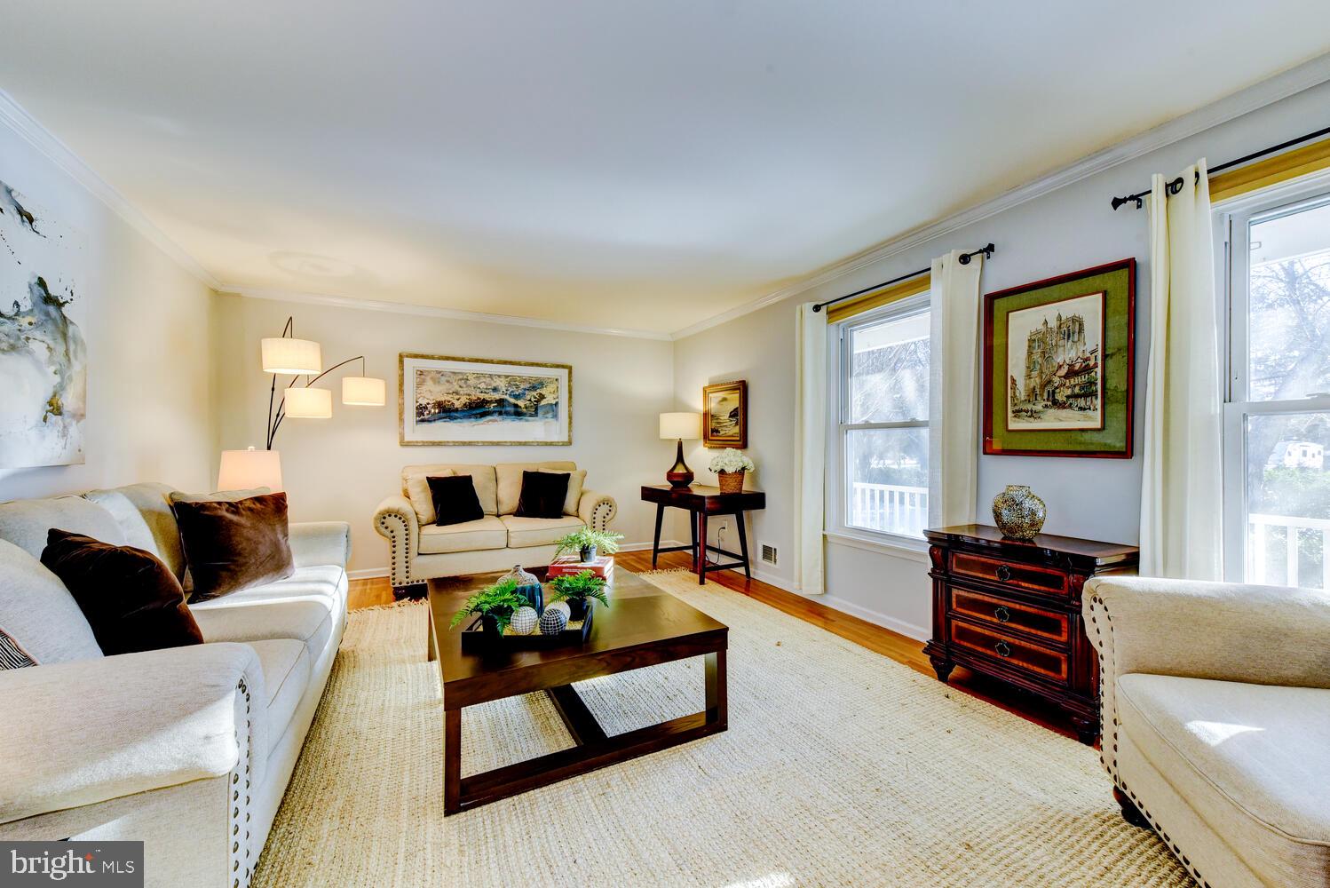374 Village Road East Princeton Junction, NJ 08550 - Photo 12 of 54 a living room with furniture and a fireplace