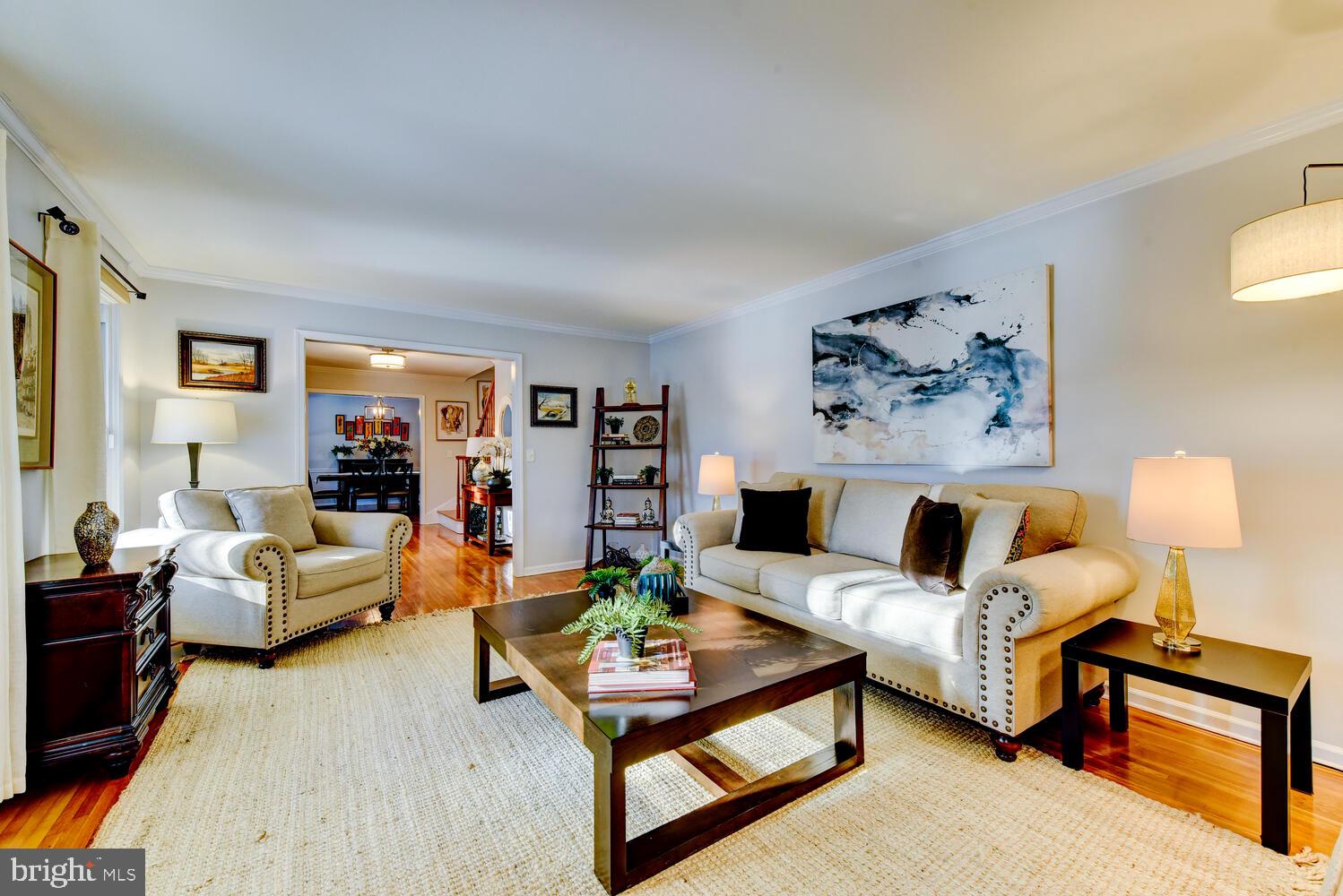374 Village Road East Princeton Junction, NJ 08550 - Photo 13 of 54 a living room with furniture and a wooden floor