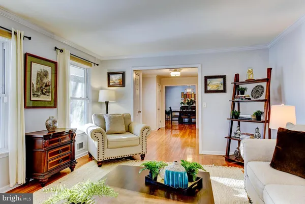 a kitchen with stainless steel appliances granite countertop a stove refrigerator and cabinets