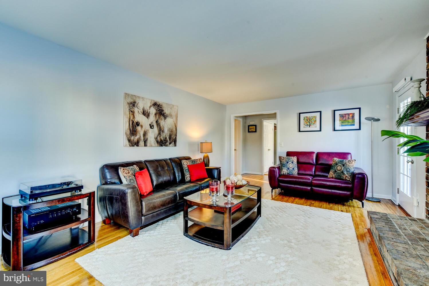 374 Village Road East Princeton Junction, NJ 08550 - Photo 29 of 54 a living room with furniture and a couch