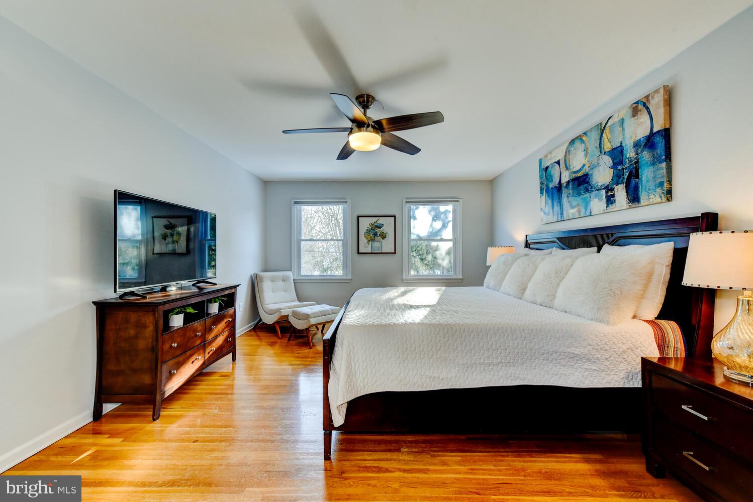 374 Village Road East Princeton Junction, NJ 08550 - Photo 34 of 54 a bedroom with a bed and a flat screen tv