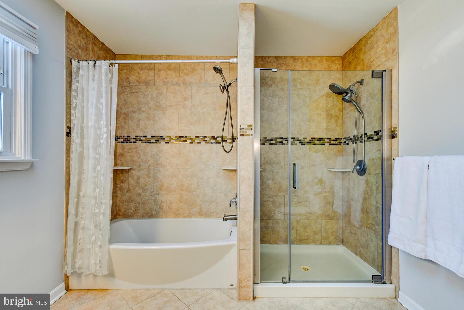 374 Village Road East Princeton Junction, NJ 08550 - Photo 37 of 54 a bathroom with a shower and a bath tub