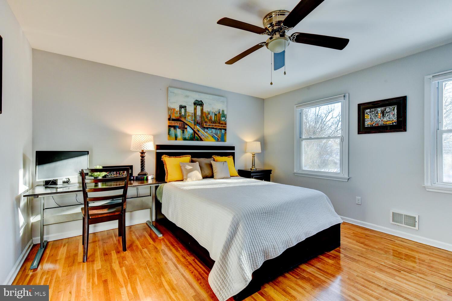 374 Village Road East Princeton Junction, NJ 08550 - Photo 43 of 54 a bedroom with a bed and a chandelier