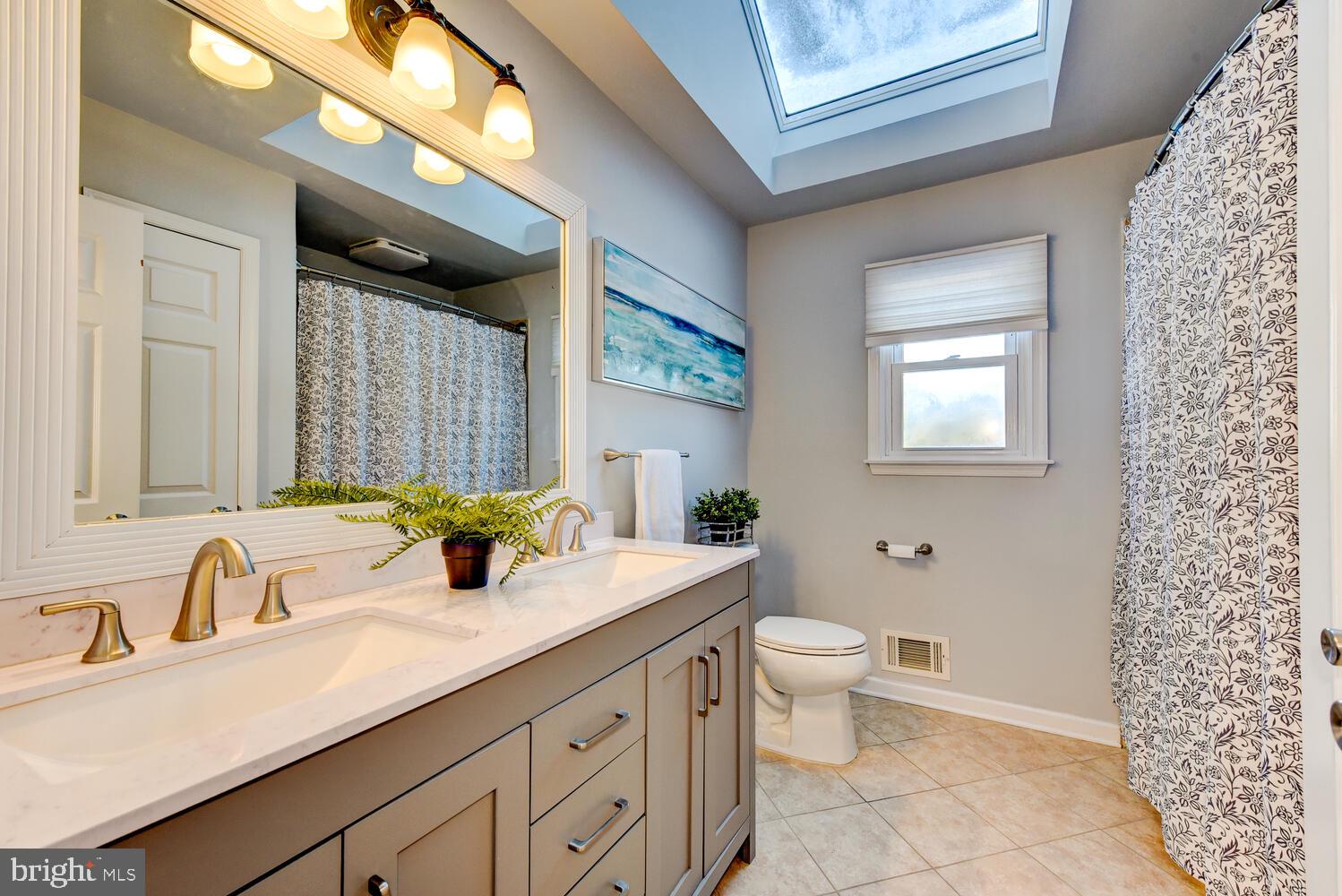 374 Village Road East Princeton Junction, NJ 08550 - Photo 45 of 54 a bathroom with a double vanity sink mirror and toilet