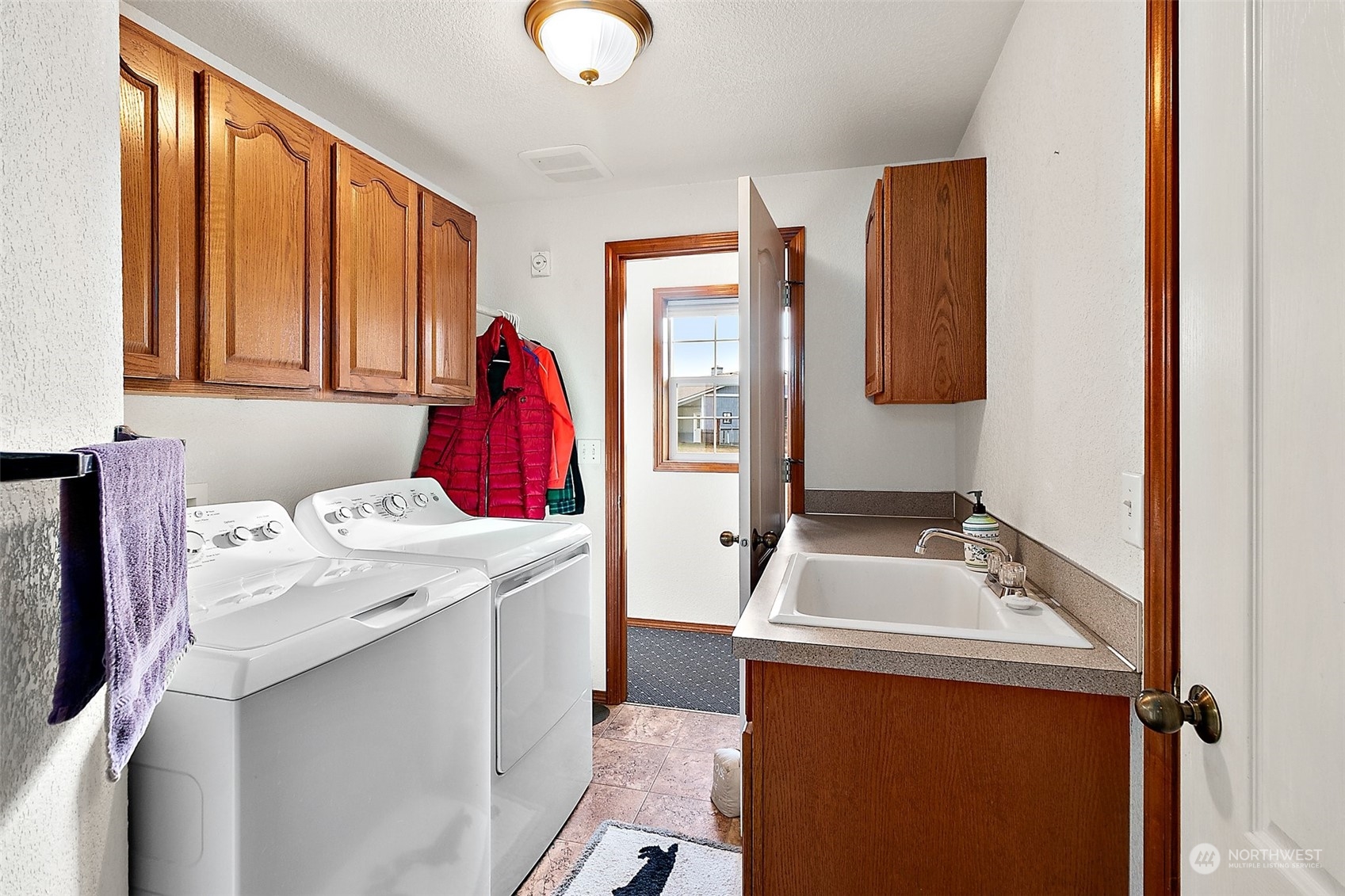 17036 Kaylen Lane Southwest Rochester, WA 98579 - Photo 16 of 40 a utility room with dryer and washer
