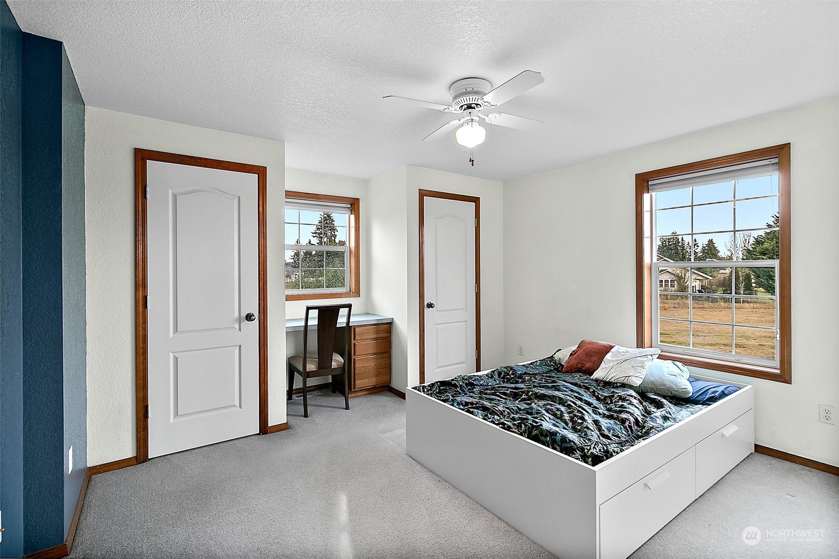17036 Kaylen Lane Southwest Rochester, WA 98579 - Photo 17 of 40 a living room with furniture and windows