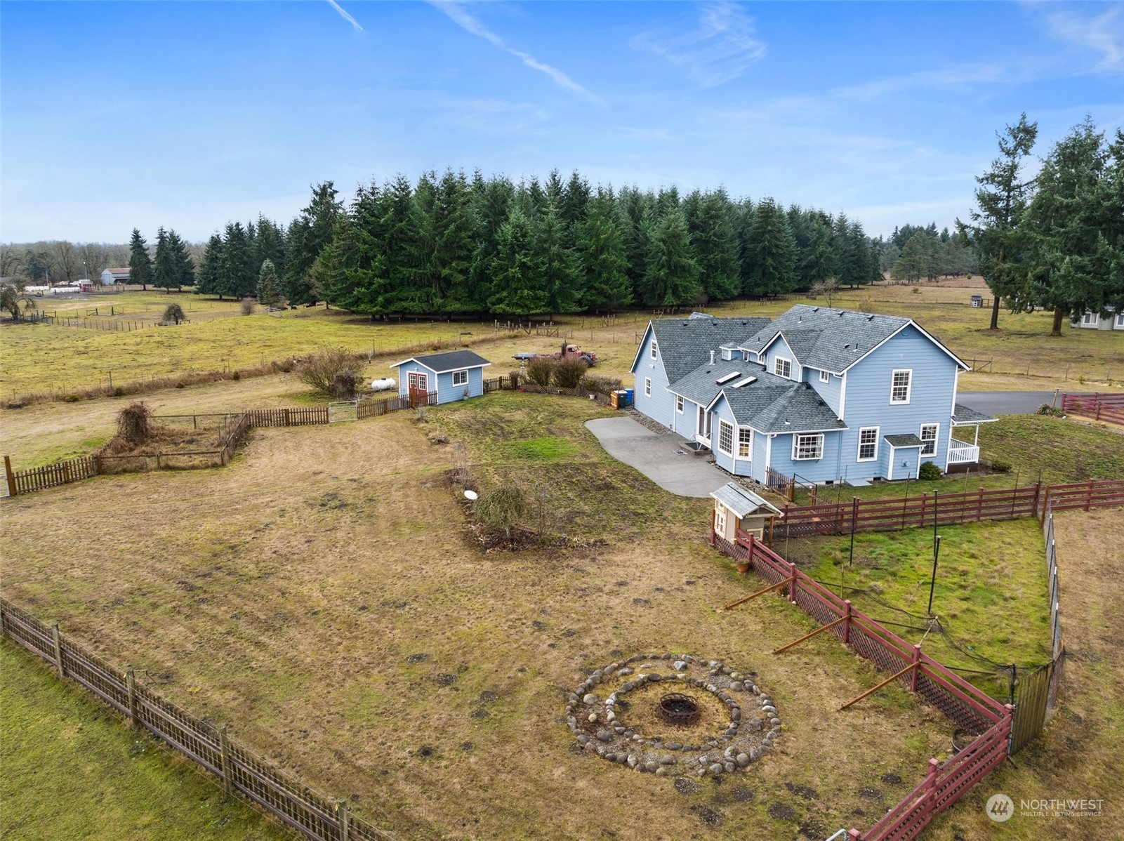 17036 Kaylen Lane Southwest Rochester, WA 98579 - Photo 36 of 40 a view of a swimming pool with a yard