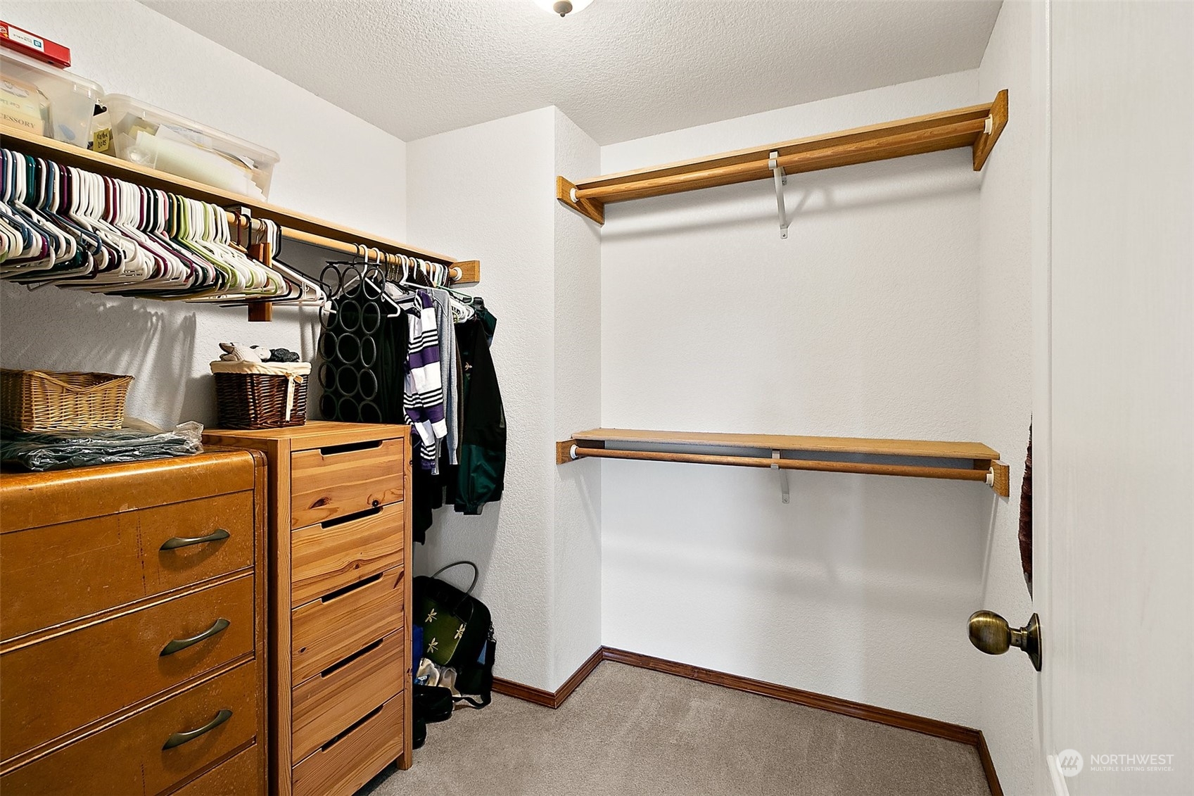 17036 Kaylen Lane Southwest Rochester, WA 98579 - Photo 9 of 40 a view of walk in closet with clothes and shoes