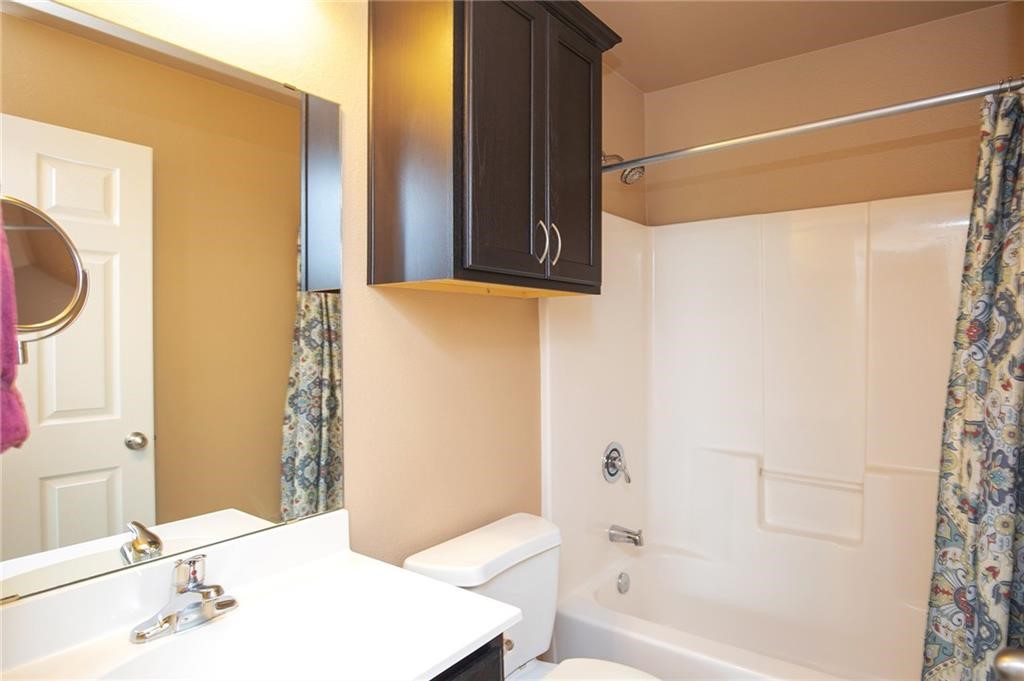 3921 Las Bahias Drive Corpus Christi, TX 78414 - Photo 14 of 16 a bathroom with a bathtub and a sink