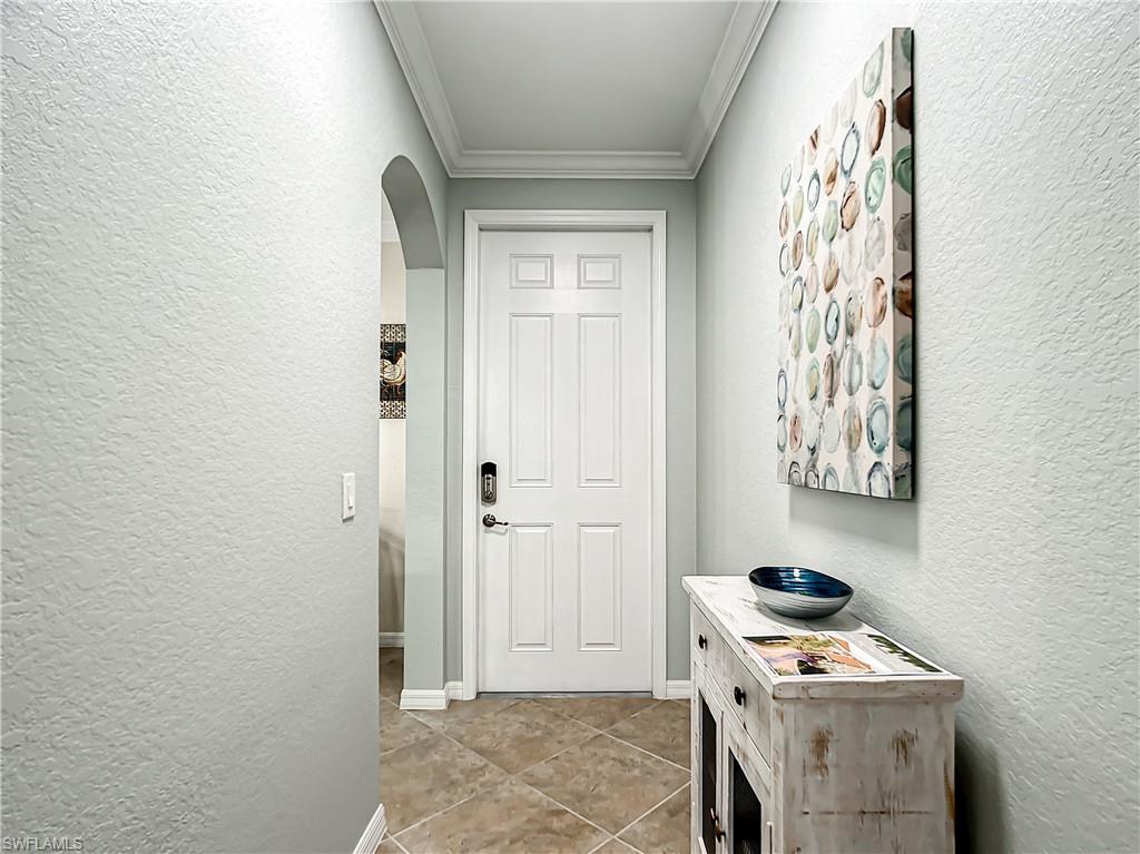 9554 Trevi Court, Unit 4715 Naples, FL 34113 - Photo 15 of 49 a room with storage and utility