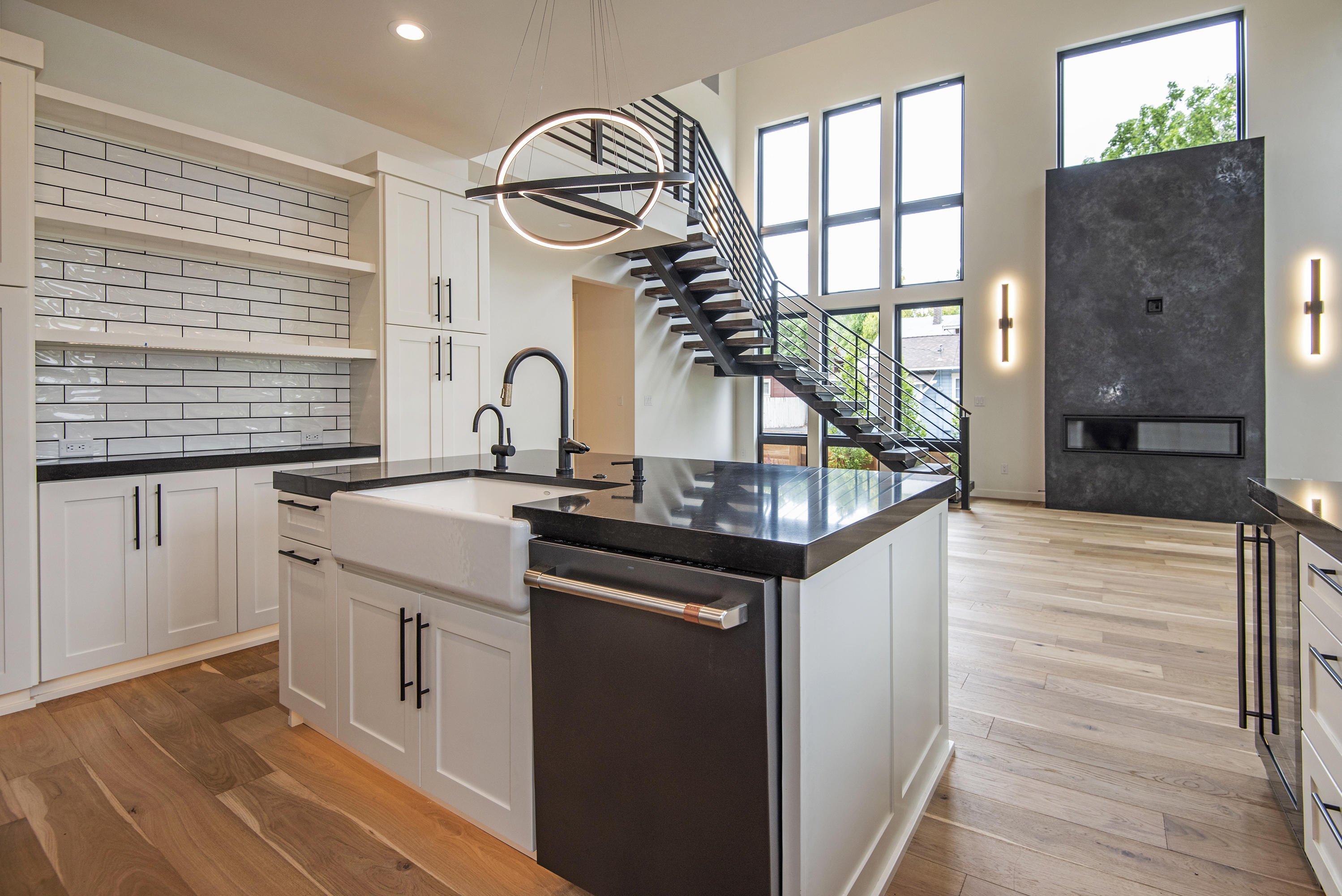 404 Northwest Riverside Boulevard Bend, OR 97703 - Photo 10 of 25 Built-in pantry with floating shelves & storage beneath.