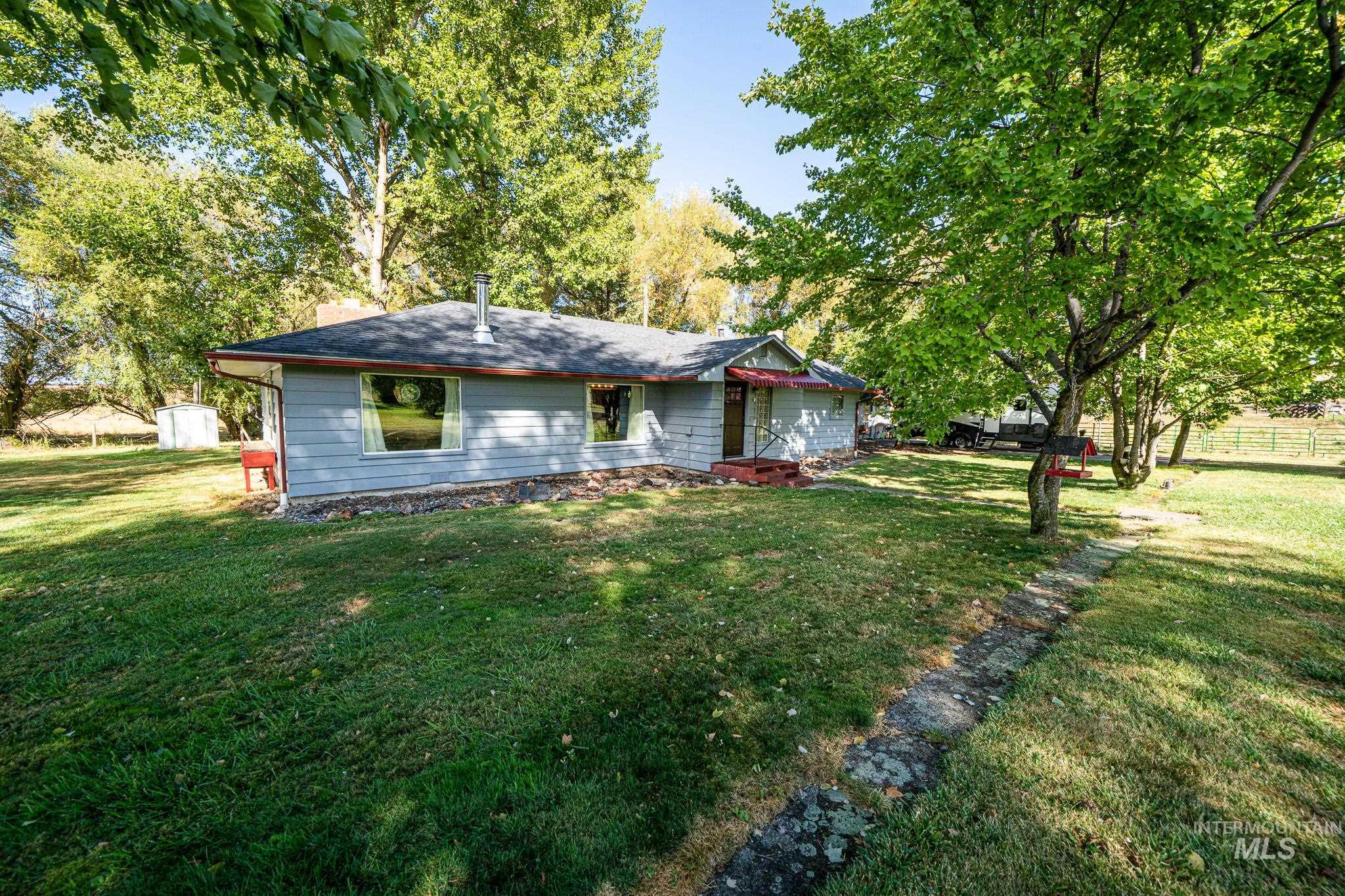 67 Jessup Road Grangeville, ID 83530 - Photo 46 of 49 Single-story residence featuring a gray exterior, dark roof, and a covered entry