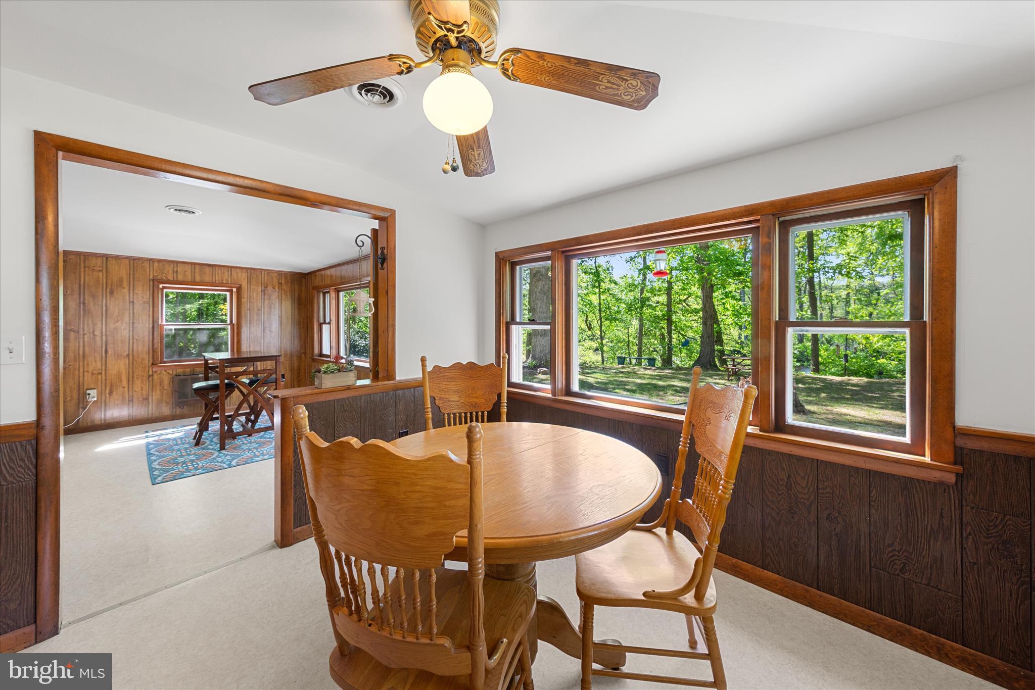 251 Rings End Road Millington, MD 21651 - Photo 11 of 47 a dining room with furniture a chandelier and window