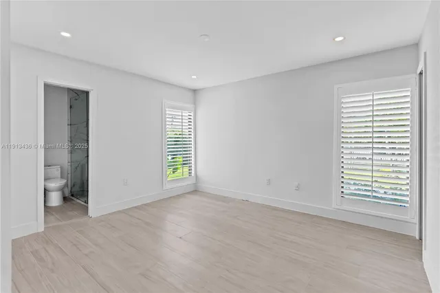 a view of a house with swimming pool and a yard