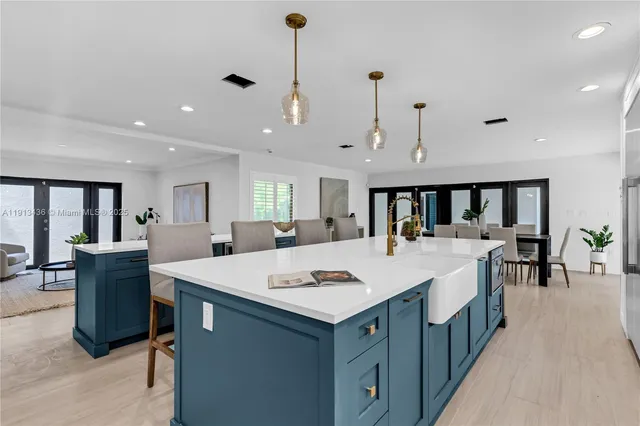 a view of a house with a small yard and plants