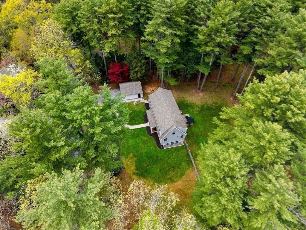 136 Holden Wood Road Concord, MA 01742 - Photo 22 of 31 an aerial view of a house with a yard basket ball court and outdoor seating
