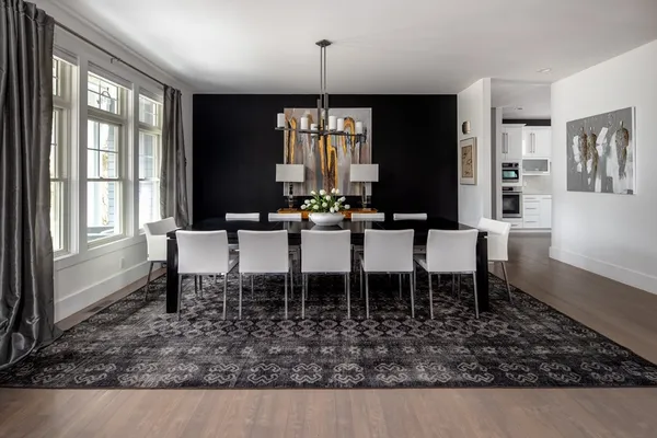 a dining room with furniture window and outside view