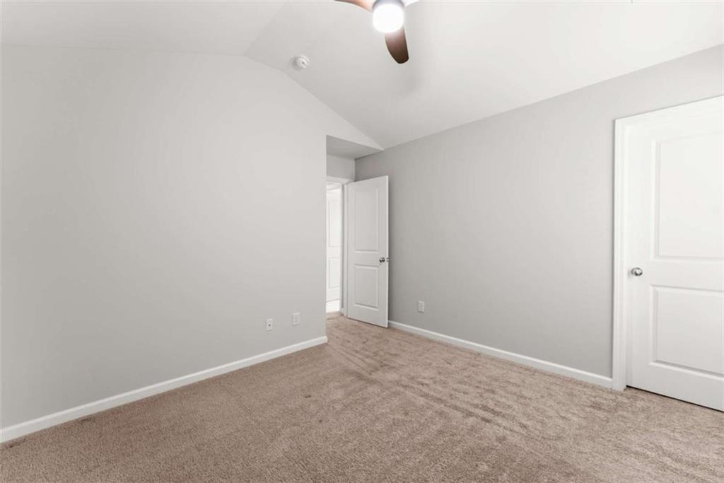 6021 Harbour Mist Drive Flowery Branch, GA 30542 - Photo 22 of 36 a view of an empty room