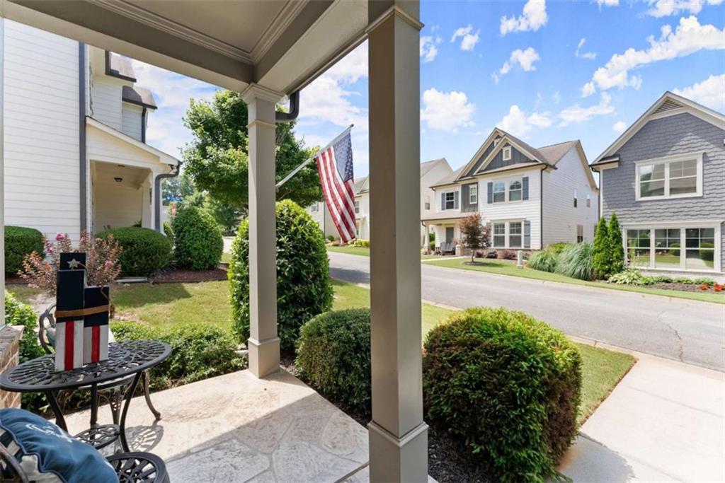 6021 Harbour Mist Drive Flowery Branch, GA 30542 - Photo 3 of 36 a view of a garden with potted plants