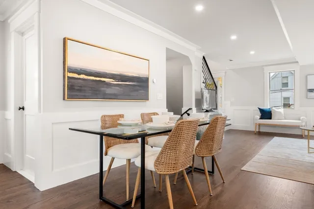 a view of a livingroom with furniture and wooden floor
