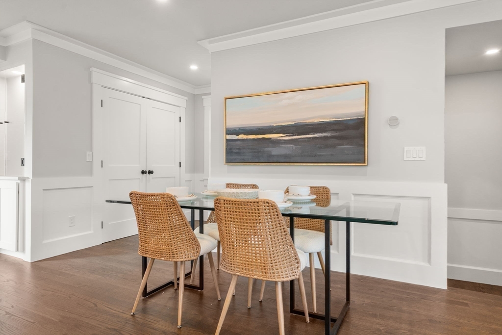 11 Macarthur Street, Unit B Somerville, MA 02145 - Photo 14 of 28 a view of a dining room with furniture and wooden floor
